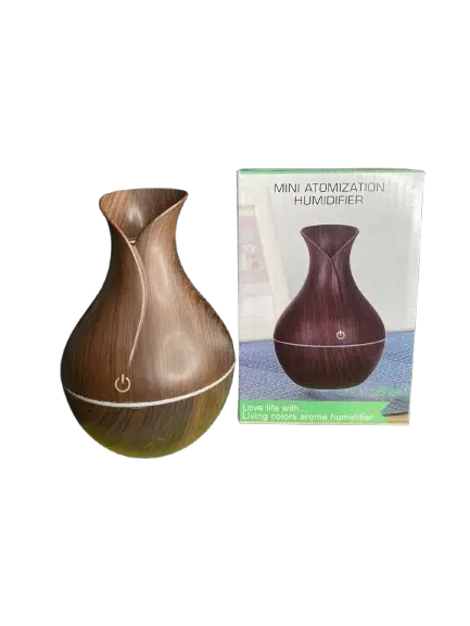 Compact mini atomization humidifier styled as a wood-grain vase with ambient light. Shop online across UAE.