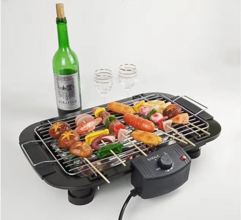Electric BBQ grill with non-stick surface & skewer rack. Perfect for indoor/outdoor grilling. Fast delivery Dubai, Abu Dhabi & UAE.